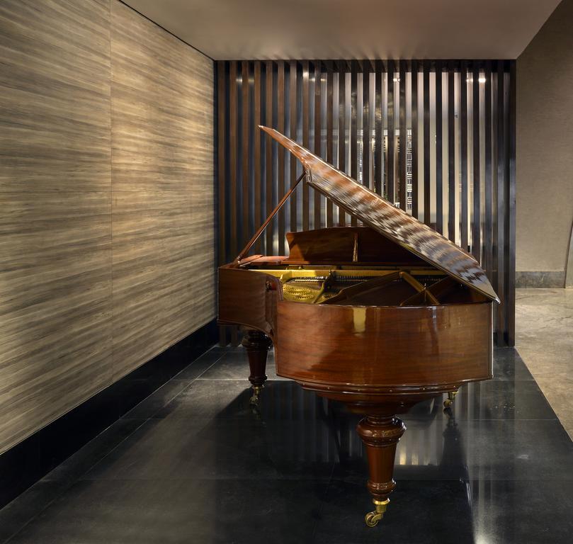The Lalit Great Eastern Kolkata Hotel Exterior photo Piano at the lobby